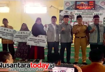 Bupati Hamartoni Hadiri Penyaluran Zakat BAZNAS Lampung Utara