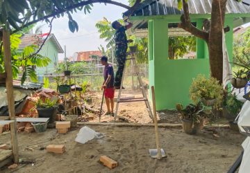 Satgas TMMD ke-129 Kodim 0418/Palembang Selesaikan Pengecatan dan Pembersihan Pos Kamling di Talang Jambe